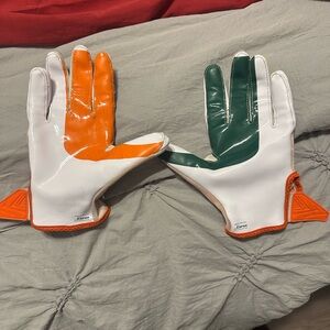 UNIVERSITY OF MIAMI Adidas Orange and Cream Football Gloves
